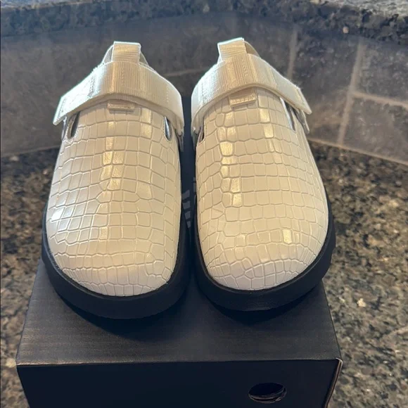 Sorel Croc-Embossed Slip-On Shoes